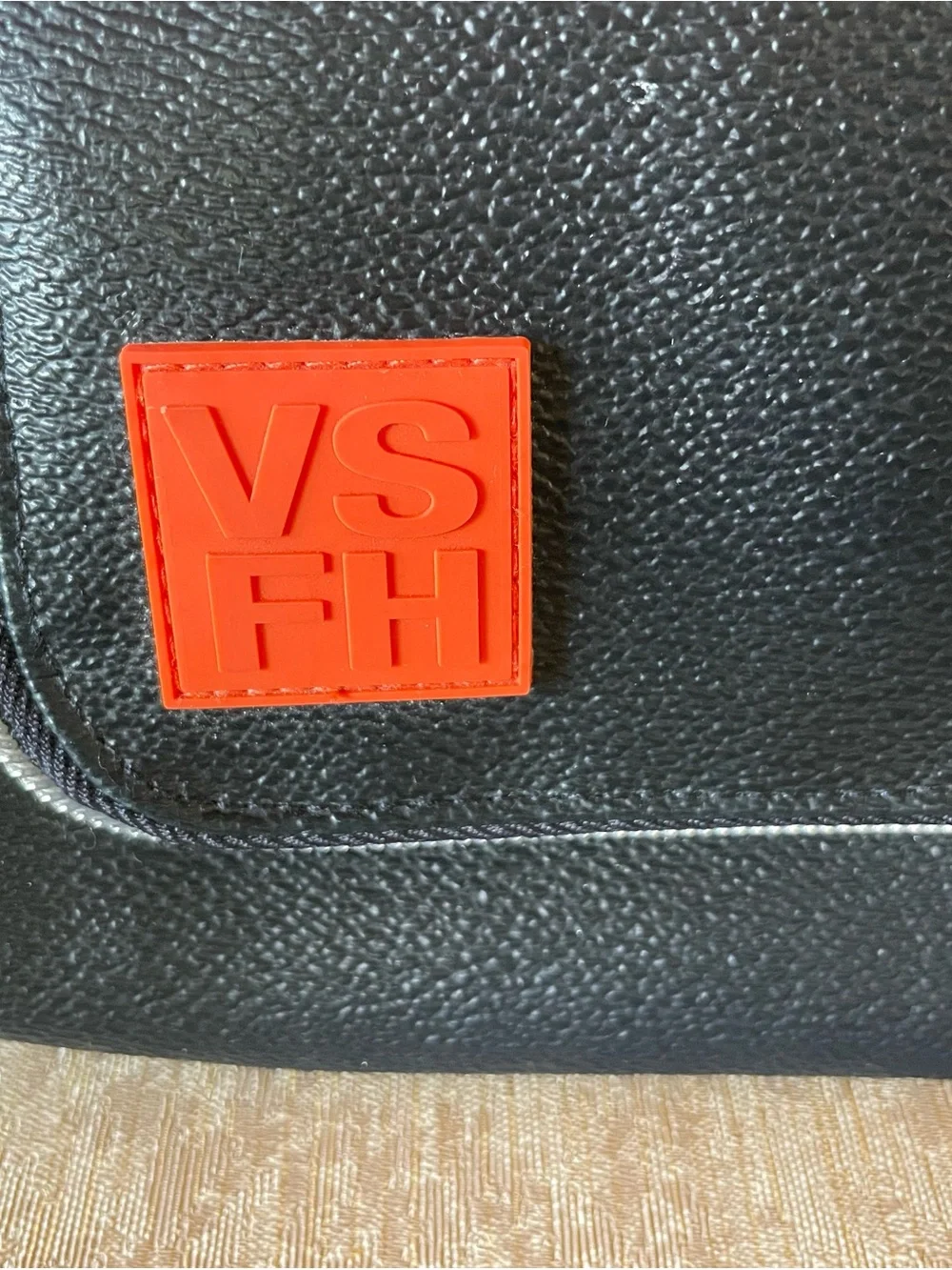 Black Cosmetic Travel Case with Orange Accent Patch